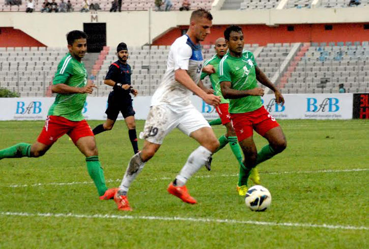 A moment of the match of the World Cup Qualifiers between Kyrgyzstan and Bangladesh at the Bangabandhu National Stadium on Thursday.