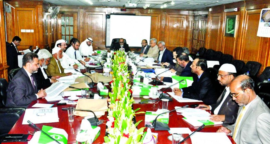 Engr Mustafa Anwar, Chairman (Acting) of Islami Bank Bangladesh Limited, presiding over the Board of Directors' meeting of the bank Friday at its head office. Local and foreign Directors of the bank were present.