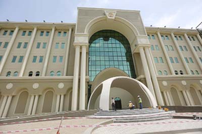 U.S. engineers chat in front of Afghanistan's new Defence Ministry building, in Kabul, Afghanistan.