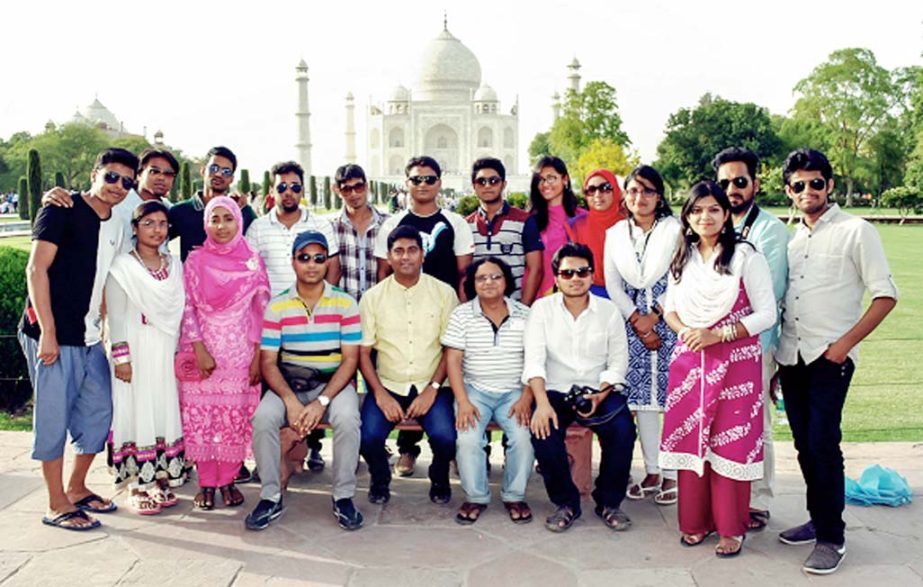 The teachers and the students of English Department of Comilla University are seen in India as a part of their exploring the SAARC countries. The snap was taken infront of the Tajmahol.