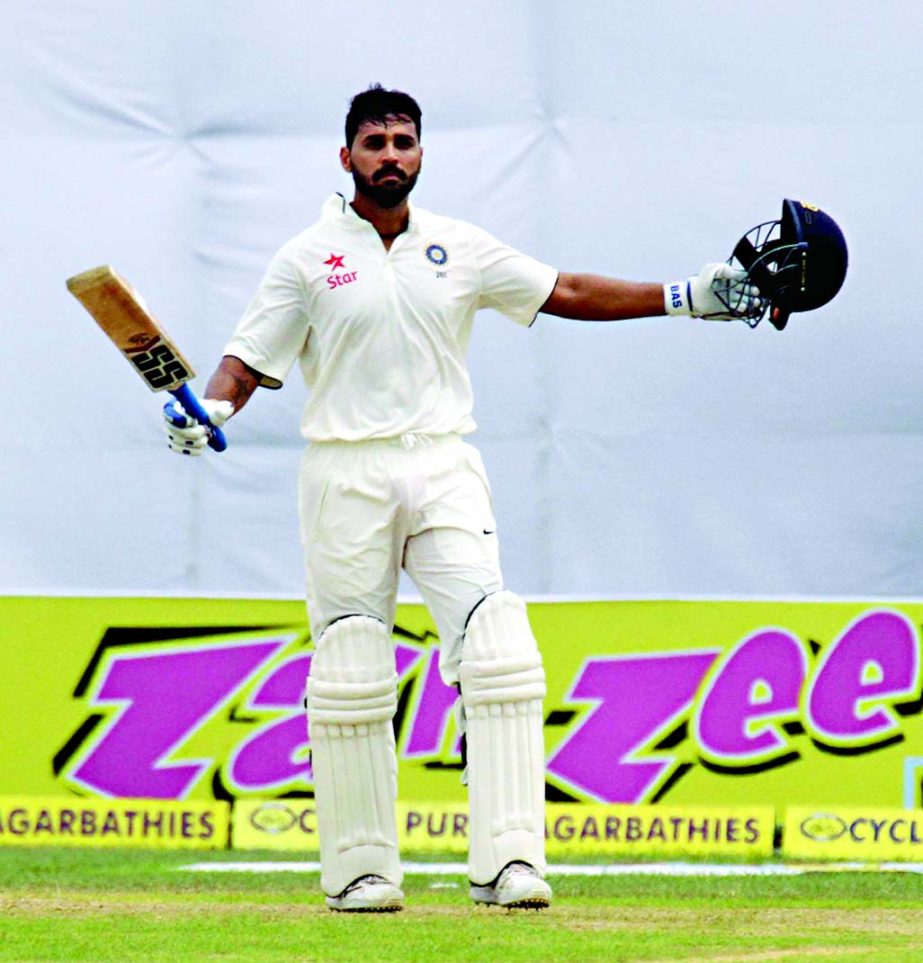 Murali Vijay celebrates his hundred on the third day of the lone Test match between Bangladesh and India at the Khan Shaheb Osman Ali Stadium in Fatullah on Friday.