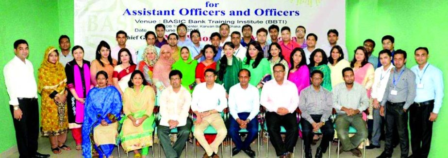 Shehab Chowdhury, Principal of the BASIC Bank Training Institute, poses with the participants of a month-long basic training course of the bank at its institute recently.