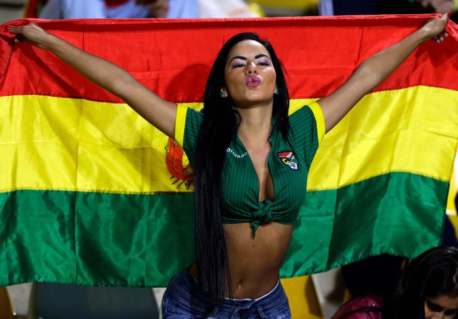 A Bolivia's fan cheers before a Copa America Group A soccer match between Mexico and Bolivia at the Sausalito Stadium in Vina del Mar, Chile on Friday.