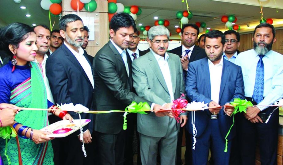 Md A Moyeen, Chairman of LankaBangla Finance Ltd, inaugurating its Barishal branch in the city on Thursday. Managing Director Md Nasir Uddin Chowdhury, Deputy Managing Director Khwaja Shahriar, LankaBangla Securities Ltd CEO Khairul Anam Chowdhury and hea