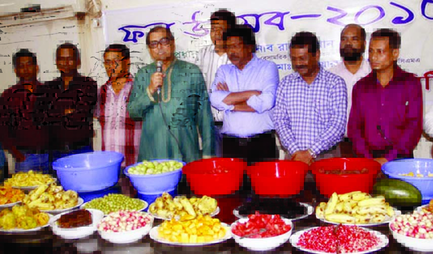 Civil Aviation and Tourism Minister Rashed Khan Menon speaking at a Fruit Festival organized at the Dhaka Reporters' Unity on Sunday.