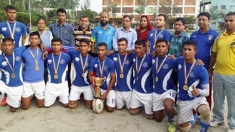 Bangladesh Army, the champions of the Diamond Melamine Federation Cup Rugby Competition and the guests and officials of Bangladesh Rugby Federation pose for a photo session at the Paltan Maidan on Sunday.