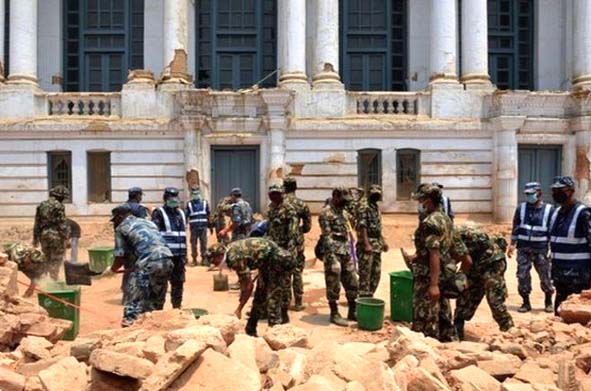 Soldiers at work clearing a street of Durbar Square