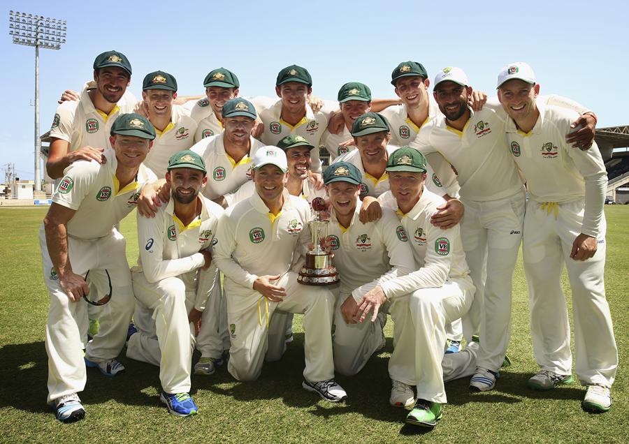 The players of Australia cricket team pose with the Frank Worrell Trophy on the 4th day against West Indies in 2nd Test at Kingston on Sunday.