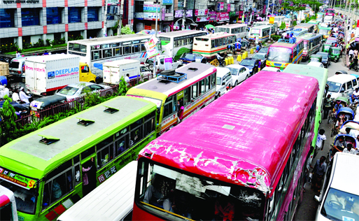 Hundreds of vehicles being stuck as city experienced massive traffic gridlock causing immense sufferings to commuters for several hours. This photo was taken from Topkhana Road on Monday.