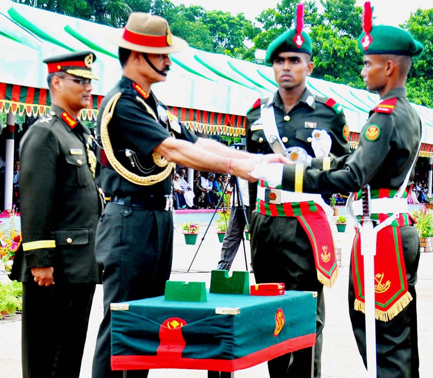 Indian Chief of Army Staff General Dalbir Singh awarding ' Sword of Honour ' to Battalion Senior Under Officer Asif Ahmed for best all round performance in 72nd BMA Long Course at BMA at Bhatiary, Chittagong yesterday. Photo : ISPR