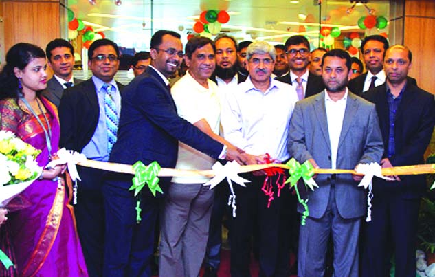 Md A Moyeen, Chairman of LankaBangla Finance Ltd, inaugurating the company's Banani branch recently. Managing Director Md Nasir Uddin Chowdhury and Deputy Managing Director Khwaja Shahriar were present.