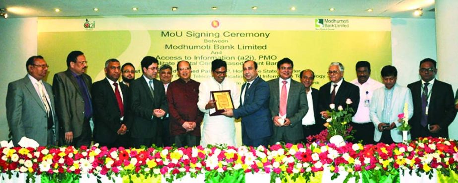 Modhumoti Bank Limited sign MoU with Access to Information (a2i), PMO to facilitate Union Digital Center (UDC)-based Agent Banking at a city hotel on Wednesday. State Minister for Posts, Telecommunications and Information Technology Zunaid Ahmed Palak, MP