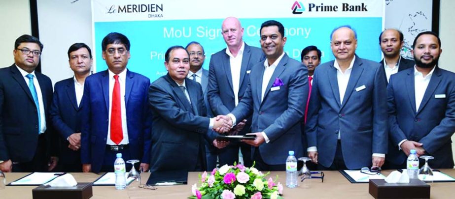 Habibur Rahman, Deputy Managing Director of Prime Bank and Ashwani Nayar, General Manager of Le MÃ©ridien Dhaka sign MoU at the hotel premises on Thursday. Prime Bank's JCB cardholders can enjoy "Buy One Get One Free" offer on Buffet Iftar and Sehr