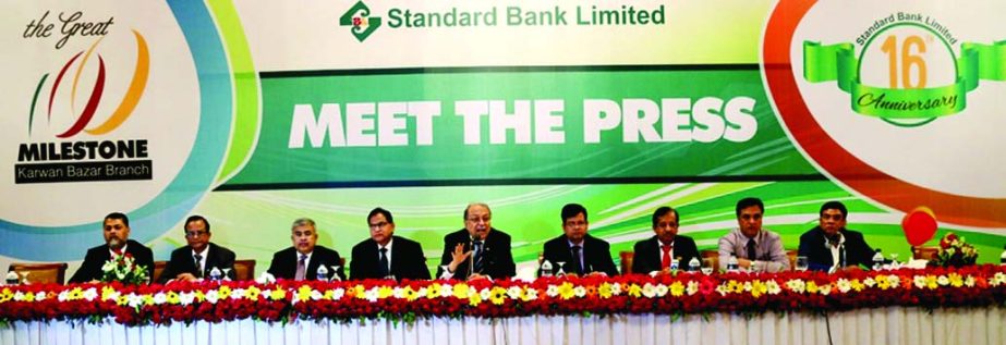 Kazi Akram Uddin Ahmed, Chairman of the Board of Directors of Standard Bank Limited, inaugurating "Spot Cash", a mobile financial service and new website of the bank and arranged a "Meet the Press" on the occasion of its 16th anniversary at a city hot