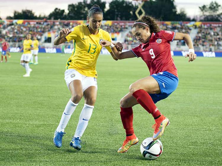 Brazil's Poliana (left) and Costa Rica's Carolina Venegas vie for the ball during the second half of a FIFA Women's World Cup soccer game in Moncton, New Brunswick, Canada on Wednesday.