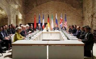 Negotiators of Iran and six world powers face each other at a table in the historic basement of Palais Coburg hotel in Vienna.