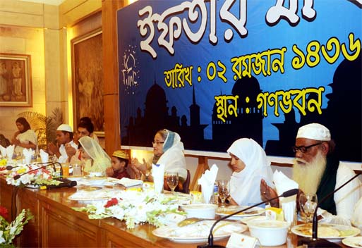 Prime Minister Sheikh Hasina offering munajat at the Iftar Mahfil organised for the crippled freedom fighters and Alem Ulema at the Ganobhaban on Saturday. BSS photo