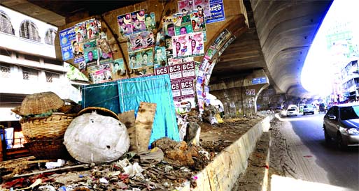 The space beneath the Hanif Flyover, on the southern side of Bangababhan being used as waste dumping place causing serious environmental hazards. This photo was taken on Saturday.