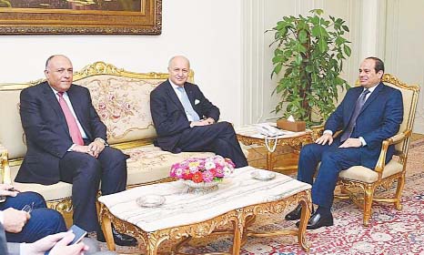 Egyptian president Abdel Fattah al-Sisi meeting French Foreign Minister Laurent Fabius and Egyptian FM Sameh Shoukry in Cairo on Saturday.