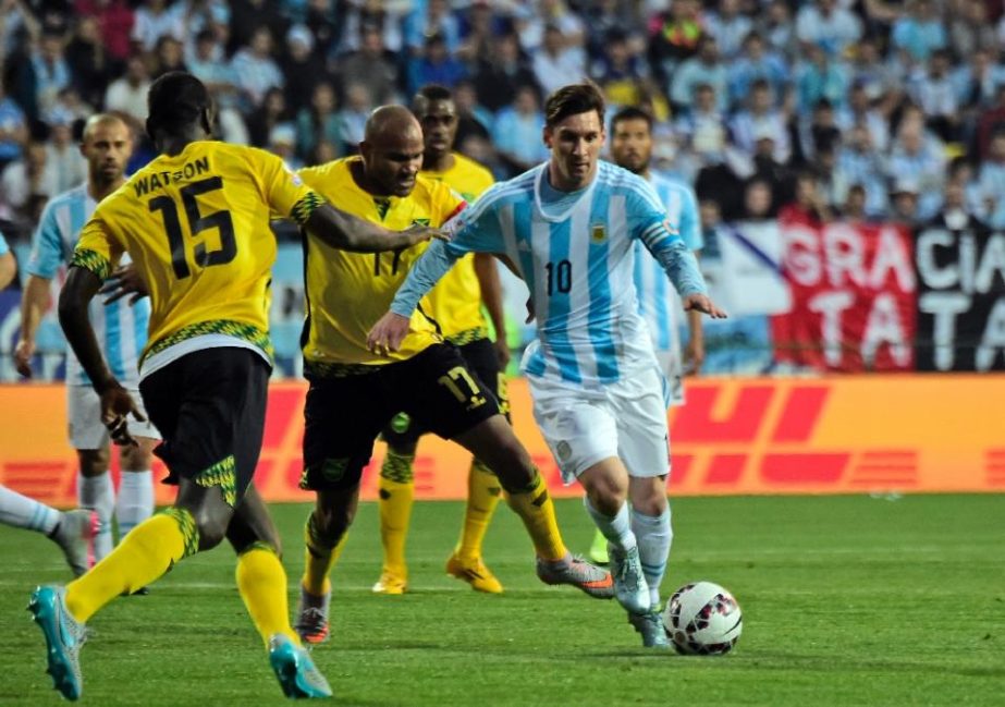 Argentina forward Lionel Messi (C) drives the ball during their Copa America match against Jamaica in Vina del Mar on Saturday.