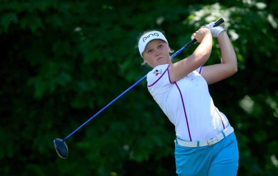 Canadian teen Brooke Henderson plays her tee shot at the par 4, 2nd hole during the final round of the Women's PGA Championship on the West Course at Westchester Country Club on June 14, 2015.