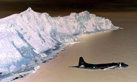 Japan Maritime Self-Defense Force P-3C Orion surveillance plane flies over the disputed islands, called the Senkaku in Japan and Diaoyu in China, in the East China Sea.