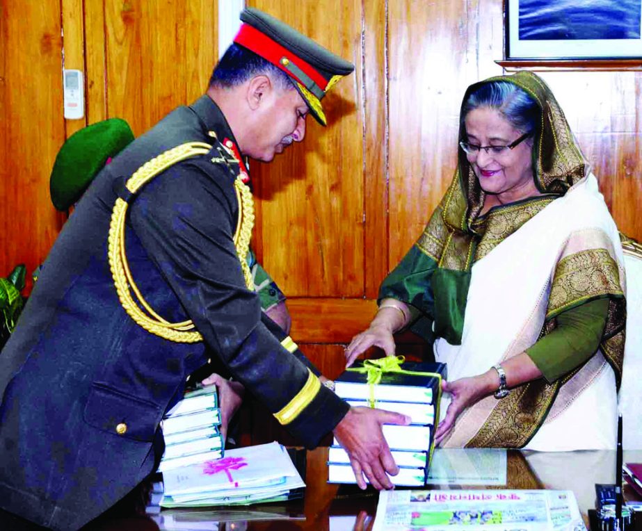 Outgoing Army Chief General Iqbal Karim Bhuiyan handed over two sets of books titled 'Bangladesh Senabahinir Itihas' and 'Muktijuddhe Samorik Abhijan' to Prime Minister Sheikh Hasina when the former paid a farewell call on the latter at her Jatiya San