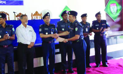 SYLHET: Md Rafiqul Hossain , Officer-In- Charge , Bishoanath thana receiving award from Sylhet Police Super Nurr -e Alam Mina PPM for his outstanding contributions in maintaining law and order situation at a function at Sylhet DIG office recently.