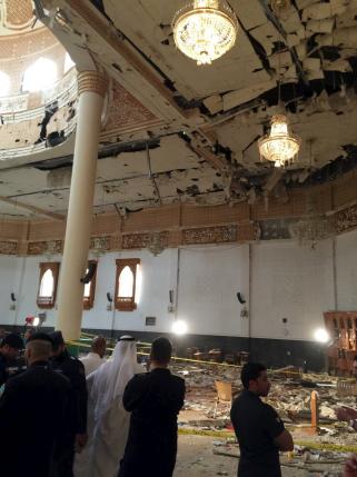 Police inspect the Imam Sadiq Mosque after a bomb explosion, in the Al Sawaber area of Kuwait City June 26, 2015. ReutersKuwait News Agency