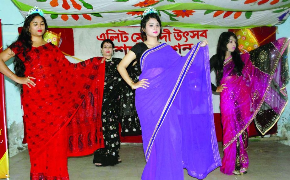 Dhakabashi, an old city-based organization organized a 'Shari Fashion Show' at Hazaribagh Community Center in the city on Friday on the occasion of ensuing Eid-ul-Fitr.