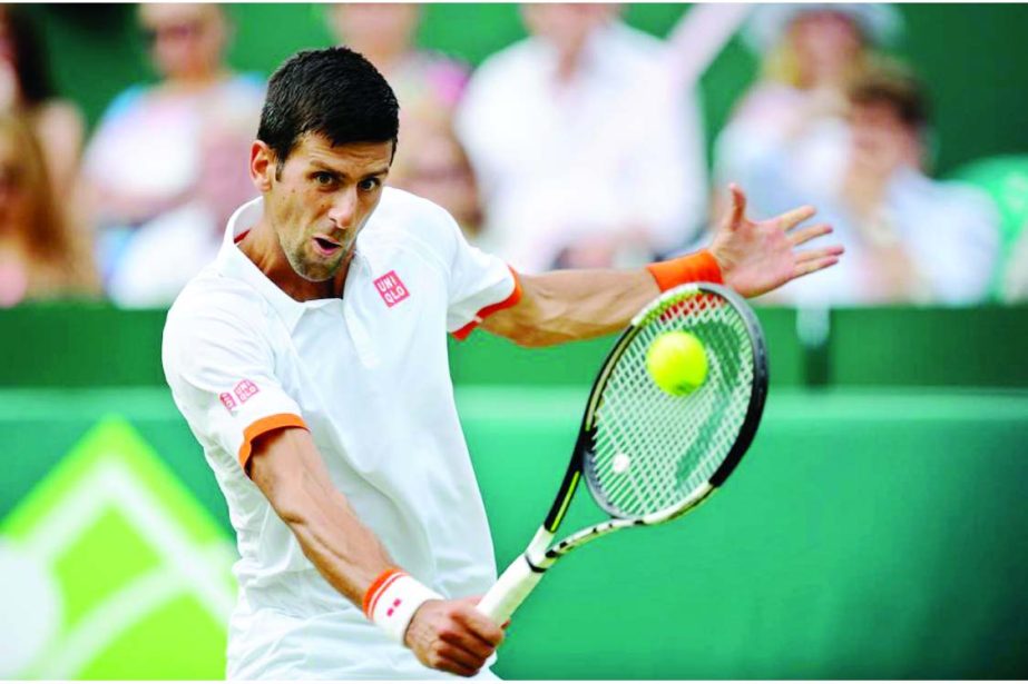 Serbia's Novak Djokovic in action against France's Richard Gasquet during day three of The Boodles tennis tournament at Stoke Park, near Stoke Poges, England on Thursday.