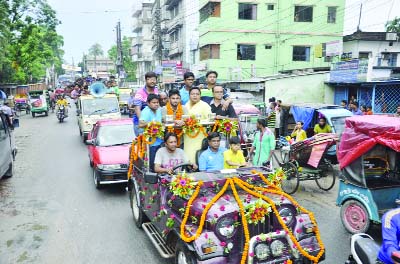 DINAJPUR: Sewchhchasebak Dal, Dinajpur District Unit brought out a rally in the town marking mass reception of player Liton Kumar Das of Bangladesh National Cricket Team on Friday.