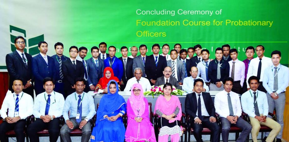 Md Badiul Alam, Managing Director (Current Charge) of National Bank Limited, poses with the participants of a foundation course for the probationary officers of the bank at NBTI recently.
