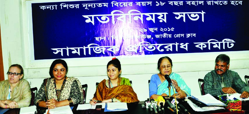 President of Mahila Parishad Ayesha Khanom speaking at an opinion sharing meeting at the Jatiya Press Club on Monday with a call to keep 18 years for the marriage of daughter child.