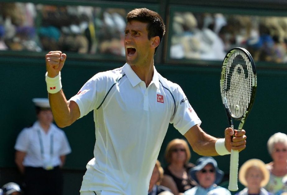 Serbia's Novak Djokovic reacts after winning his men's singles first round match against Germany's Philipp Kohlschreiber at Wimbledon on Monday.