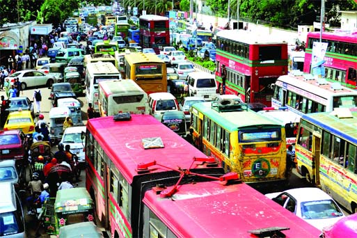 Thousands of vehicles got stuck as city witnessed massive gridlock all over causing immense sufferings to commuters and Eid shoppers. This photo was taken from Shahbagh area on Monday.