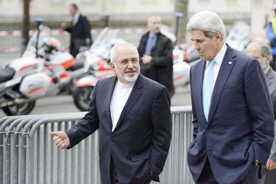 U.S. Secretary of State John Kerry, right, speaks with Iranian Foreign Minister Mohammad Javad Zarif, as they walk in Geneva, Switzerland, ahead of the next round of nuclear discussions.