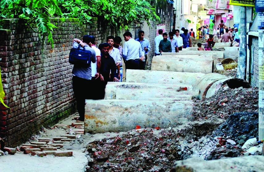 Road digging causes immense sufferings to the pedestrians and passengers for long. But the authority concerned remain indifferent to mitigate the woes of the commuters. The snap was taken from the city's Indira Road, Farmgate on Tuesday.