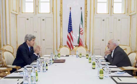 US Secretary of State John Kerry (L) meets with Iranian Foreign Minister Javad Zarif at a hotel in Vienna, Austria.