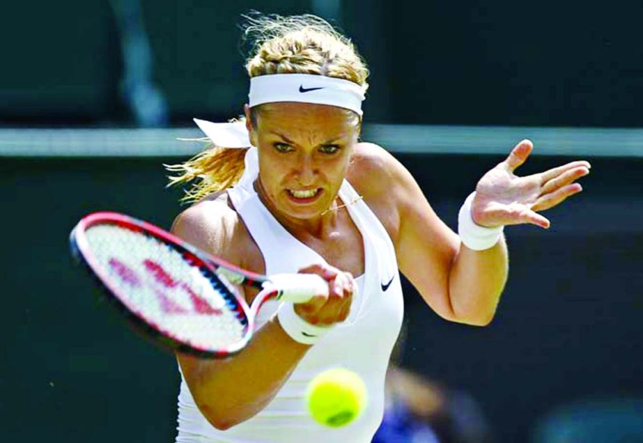 Sabine Lisicki of Germany makes a return to Christina McHale of the United States during their singles match at the All England Lawn Tennis Championships in Wimbledon, London on Thursday.