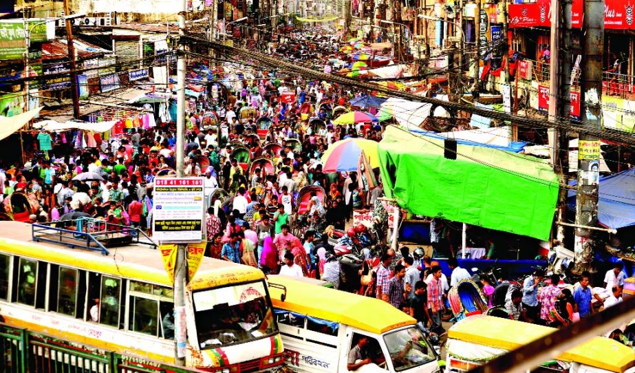 City witnessing severe traffic congestion even on Friday as unlicensed rickshaws, van and unfit vehicles come out in the streets ahead of Eid, causing immense sufferings to Eid shoppers. This photo was taken from New Market area.