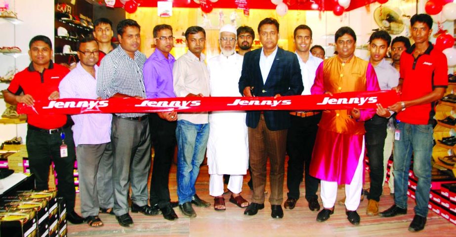 Nasir Khan, Chairman of Jennys Group, inaugurating new outlet at Uttara in the city recently. The company is displaying a vast exhibition of 500 items of exclusively designed shoes for the customers and clients for upcoming Eid. v