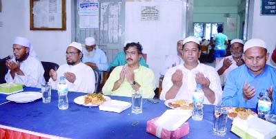 DINAJPUR: Participants offering Munajat at an Iftar Mahfil in Kaharul Upazila organised by Sundorpur Union Parishad on Friday.