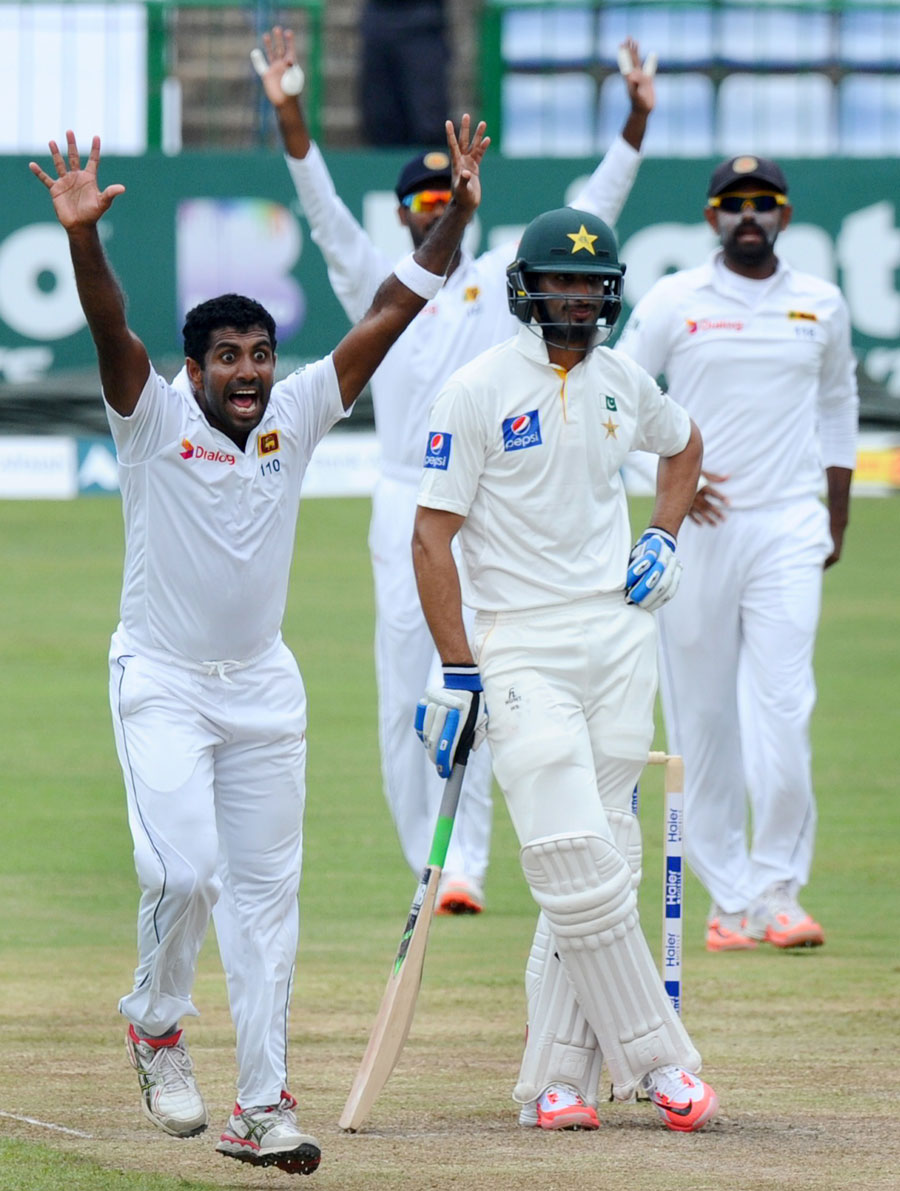 Dhammika Prasad successfully appeals for the wicket of Shan Masood during 2nd day of 3rd Test between Sri Lanka and Pakistan at Pallekele on Saturday.