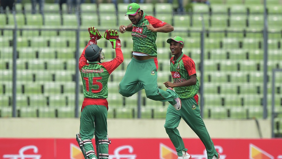 Mashrafe Mortaza leaps in joy after catching AB de Villiers in the first T20 international in Mirpur Â© AFP