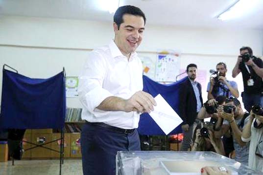Greek Prime Minister Alexis Tsipras votes at a polling station in Athens, Greece on Sunday.
