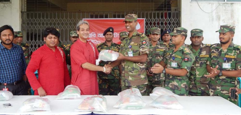 Robi distributed relief goods among flood victims in Cox'sBazar yesterday.
