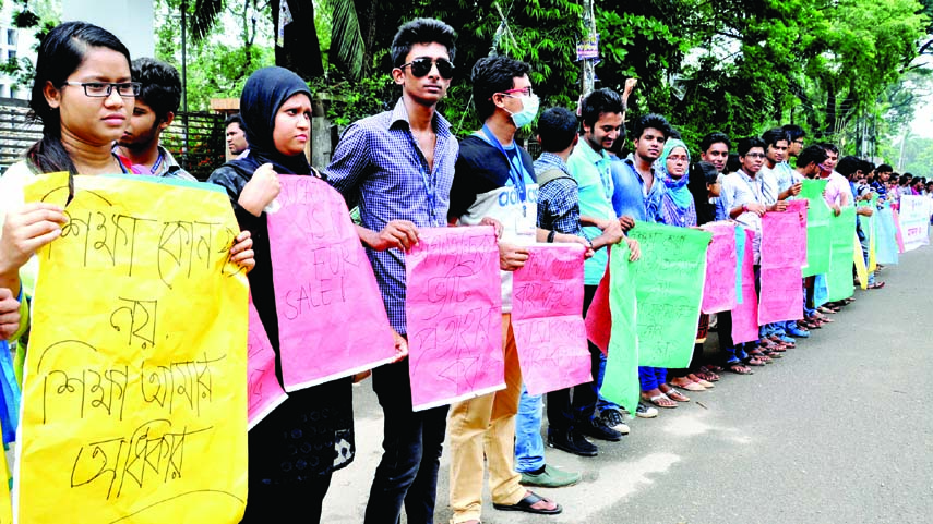 Gana Bishwabiddalaya students formed a human chain in front of Jatiya Press Club on Sunday demanding withdrawal of VAT that imposed on the Education Sector.
