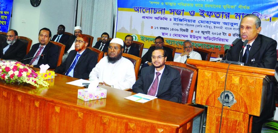 Muhammad Abul Bashar, Deputy Managing Director of Islami Bank Bangladesh Limited, addressing a discussion on 'Role of Mahe Ramzan in Purifying Wealth and Soul' at the bank's head office branch on Sunday.