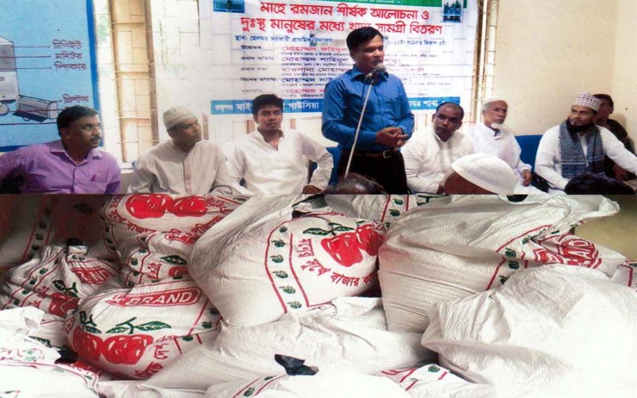 Shaheenur Islam Shanu, Chairman, 9 no Borlia Union Parishad speaking at a food items distributing programme organised by Maijbhandaria Gousiya Huq Committee Bangladesh, Melghar Branch Unit recently.